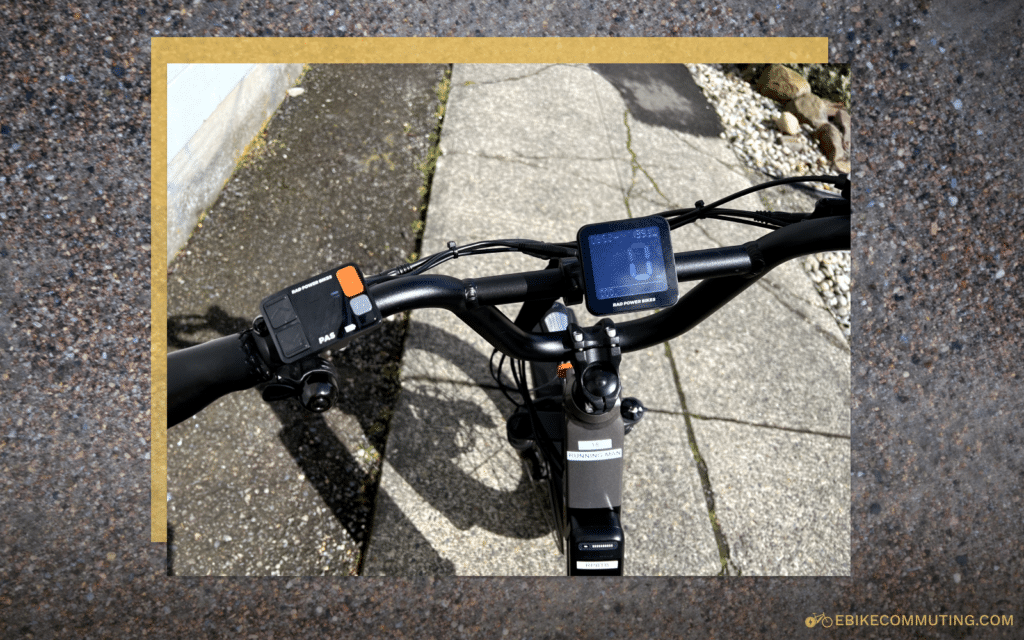 A close-up of Rad Power Bikes' RadRunner 3 Plus's pedal assist selector and LCD display